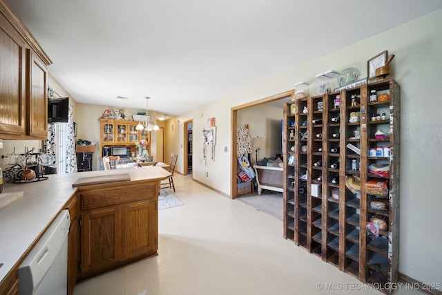 wine area featuring an inviting chandelier