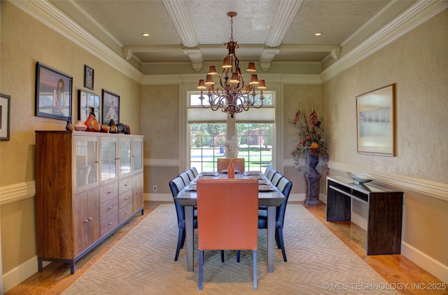 dining area with coffered ceiling, a notable chandelier, light hardwood / wood-style flooring, and beamed ceiling