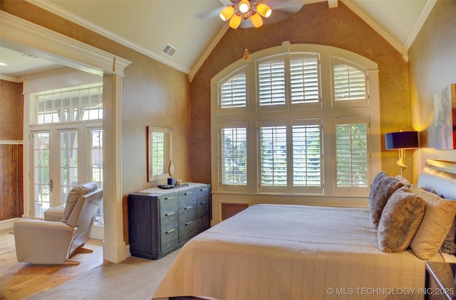 bedroom with crown molding, ceiling fan, high vaulted ceiling, and multiple windows