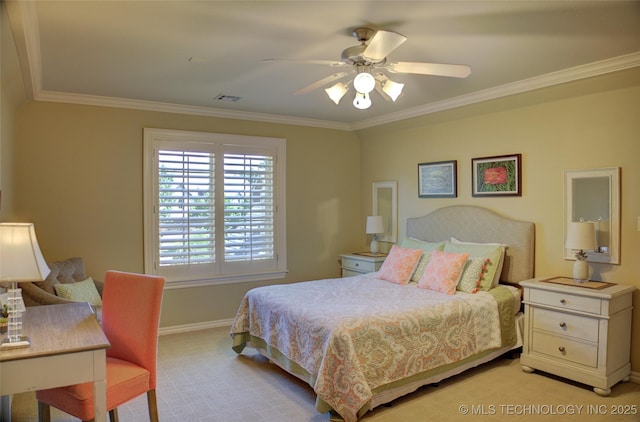 carpeted bedroom with crown molding and ceiling fan