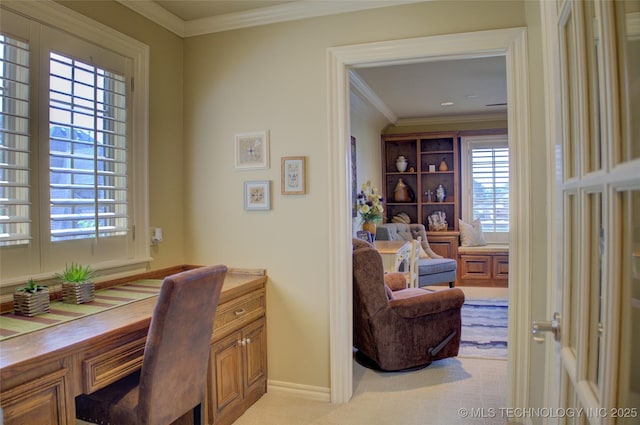 office featuring crown molding and light carpet