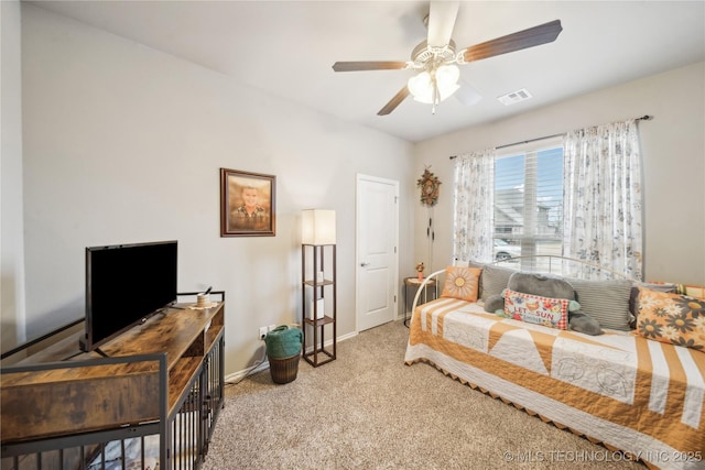 living room featuring light colored carpet and ceiling fan