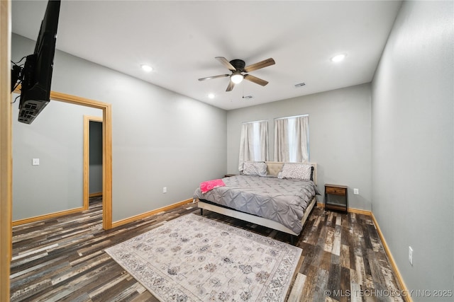 bedroom featuring dark wood-type flooring and ceiling fan