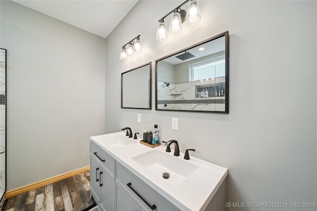 bathroom featuring vanity, hardwood / wood-style floors, and walk in shower