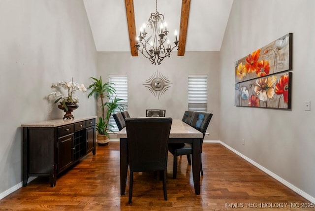 dining space with high vaulted ceiling, baseboards, and dark wood finished floors