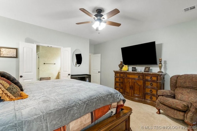 bedroom with light colored carpet and ceiling fan