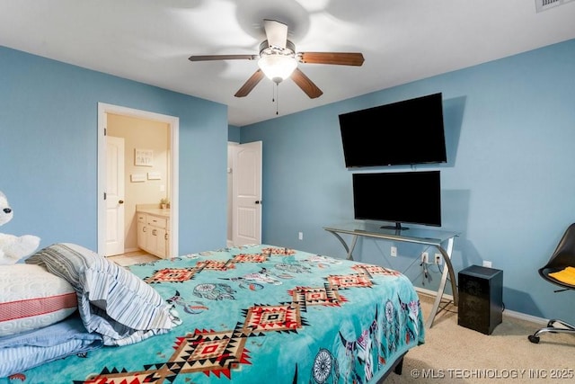 bedroom with ceiling fan, connected bathroom, light carpet, visible vents, and baseboards