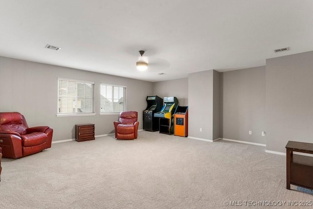 interior space featuring carpet floors, visible vents, and baseboards