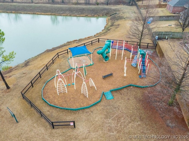 view of playground with a water view