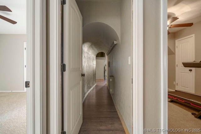 corridor with arched walkways