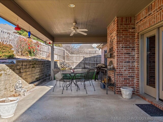 view of patio with ceiling fan