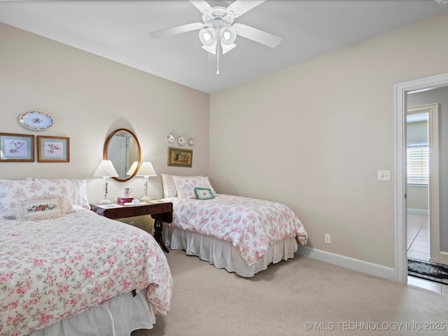 bedroom with light colored carpet and ceiling fan