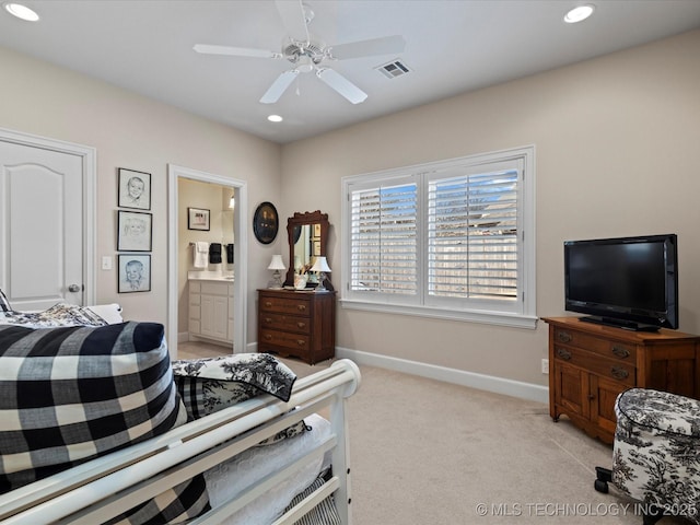 2941 Versailles Pl, Bartlesville, OK 74006 - bedroom featuring light carpet, recessed lighting, baseboards, connected bathroom, and ceiling fan