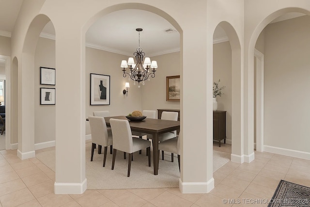 2941 Versailles Pl, Bartlesville, OK 74006 - dining area with light tile patterned floors, crown molding, baseboards, a chandelier, and light colored carpet