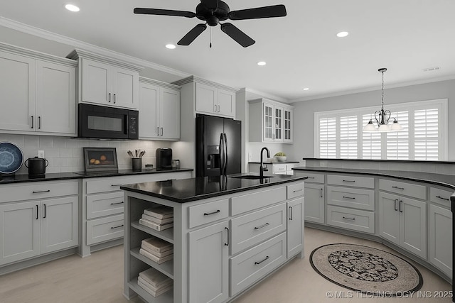 2941 Versailles Pl, Bartlesville, OK 74006 - kitchen with black appliances, a sink, dark countertops, open shelves, and ceiling fan