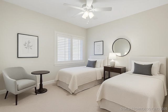 2941 Versailles Pl, Bartlesville, OK 74006 - bedroom with baseboards, light colored carpet, and ceiling fan