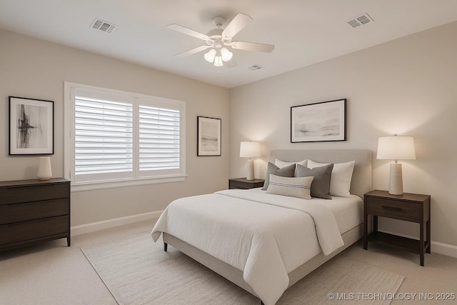 2941 Versailles Pl, Bartlesville, OK 74006 - bedroom with light carpet, baseboards, and ceiling fan