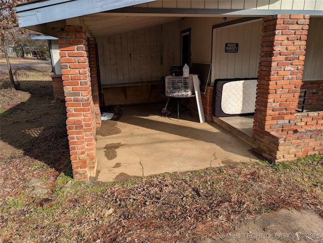 view of patio featuring a carport