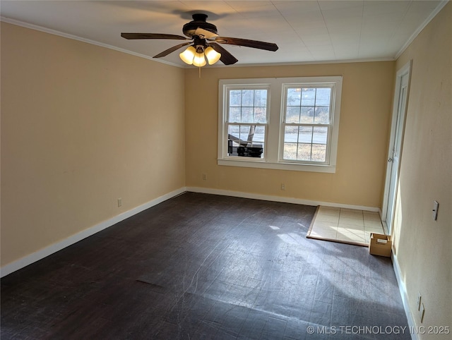 empty room with crown molding, ceiling fan, and dark hardwood / wood-style flooring