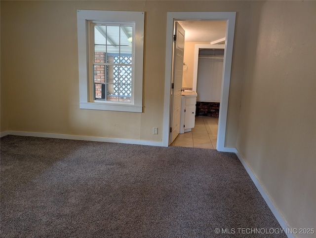 view of carpeted spare room