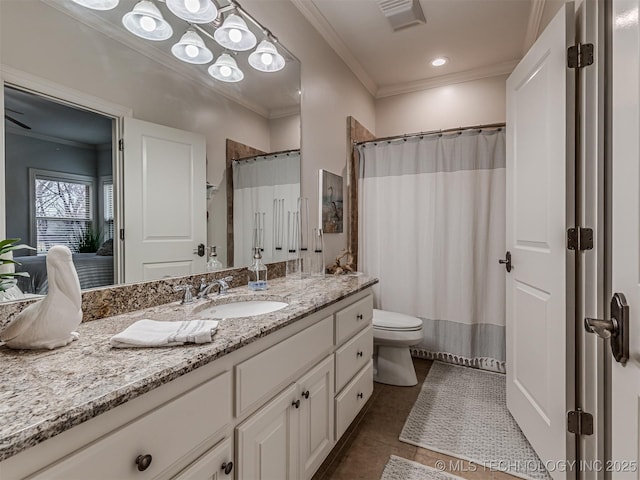 bathroom with toilet, crown molding, a shower with curtain, vanity, and tile patterned flooring