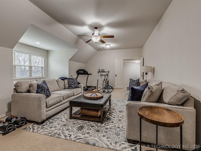 living room with ceiling fan and carpet floors