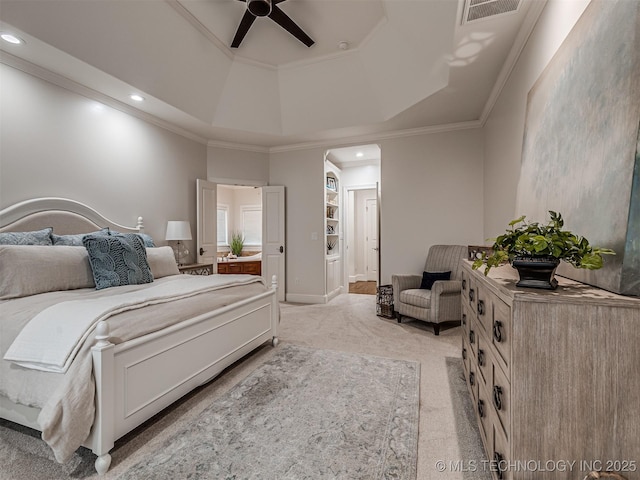 bedroom with light carpet, ornamental molding, a raised ceiling, and ceiling fan