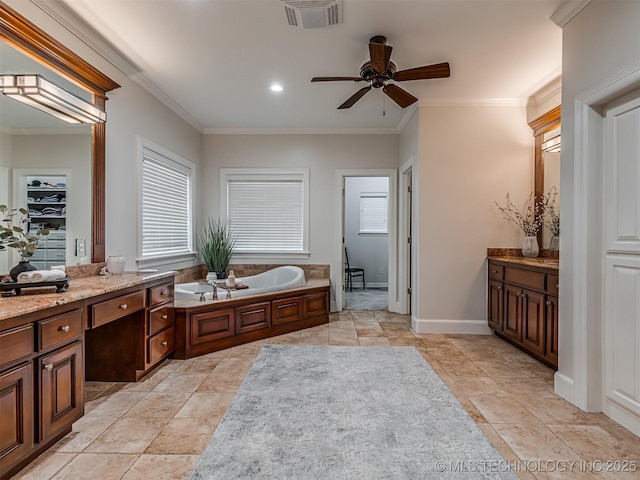 bathroom with crown molding, a bath, vanity, and ceiling fan