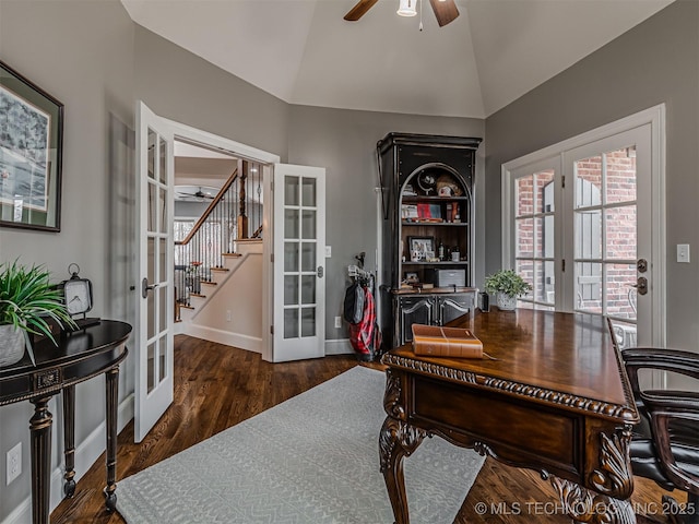 office space with dark hardwood / wood-style floors, vaulted ceiling, french doors, and ceiling fan