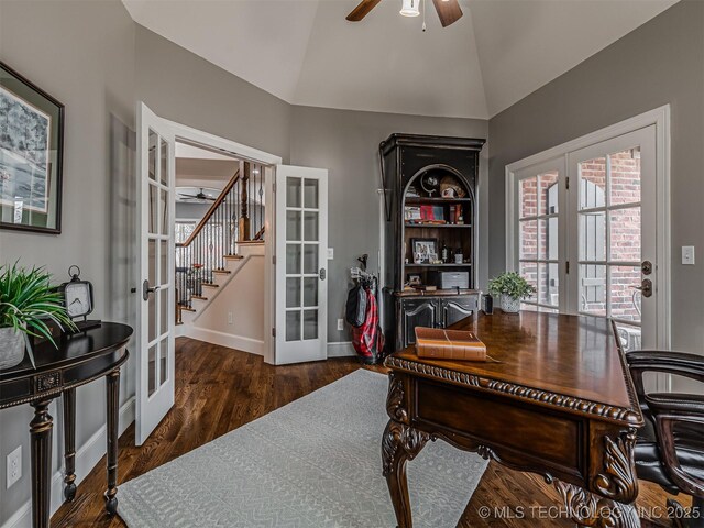 home office featuring french doors, ceiling fan, lofted ceiling, and dark wood-type flooring