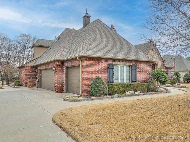 view of side of home featuring a lawn