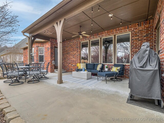 view of patio featuring ceiling fan and an outdoor living space