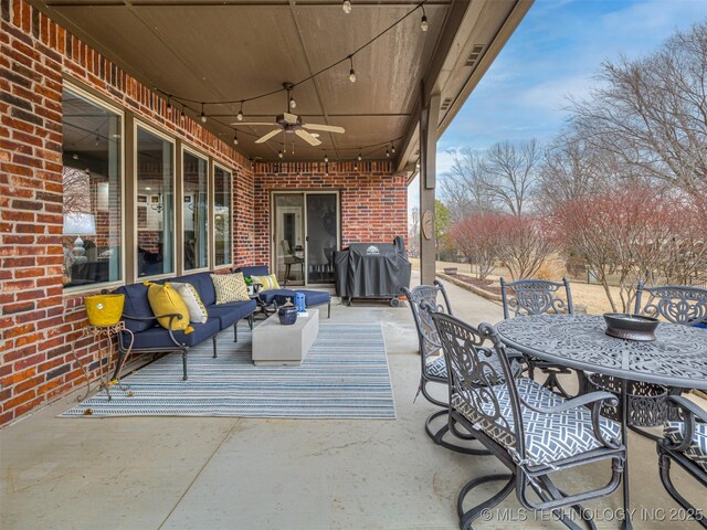 view of patio / terrace featuring area for grilling, an outdoor hangout area, and ceiling fan