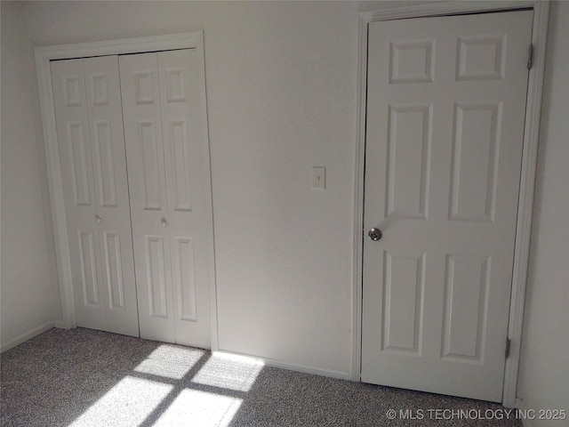 unfurnished bedroom featuring a closet