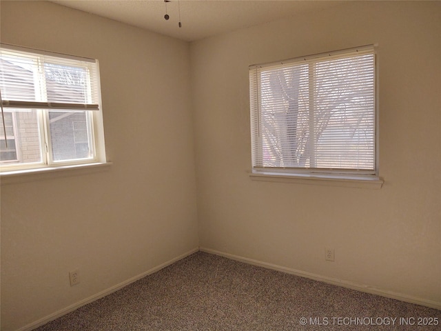 spare room with carpet flooring