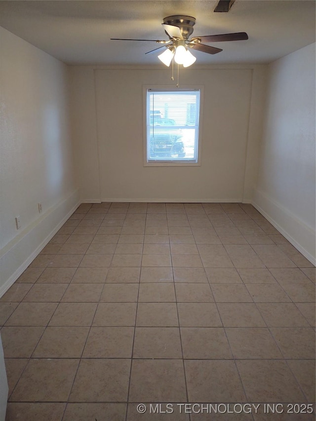 unfurnished room with light tile patterned flooring and ceiling fan