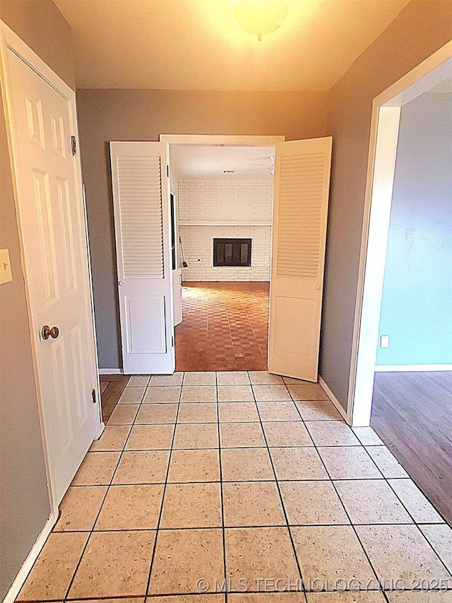 hall featuring tile patterned floors