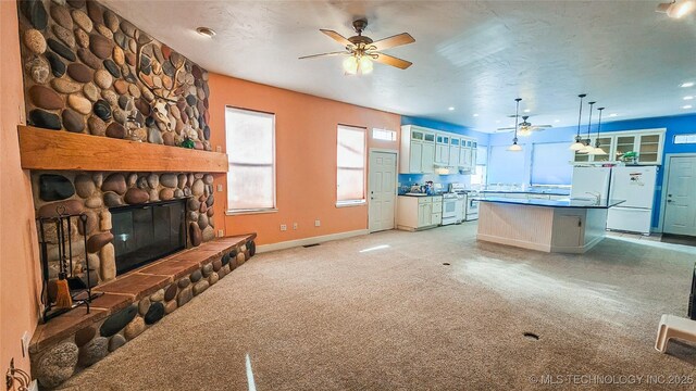 116568 S 4268th Rd, Checotah, OK 74426 - kitchen featuring white appliances, a ceiling fan, glass insert cabinets, light carpet, and dark countertops