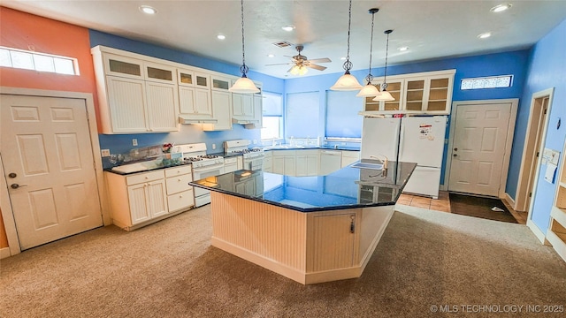 116568 S 4268th Rd, Checotah, OK 74426 - kitchen with white appliances, light colored carpet, a ceiling fan, recessed lighting, and a sink