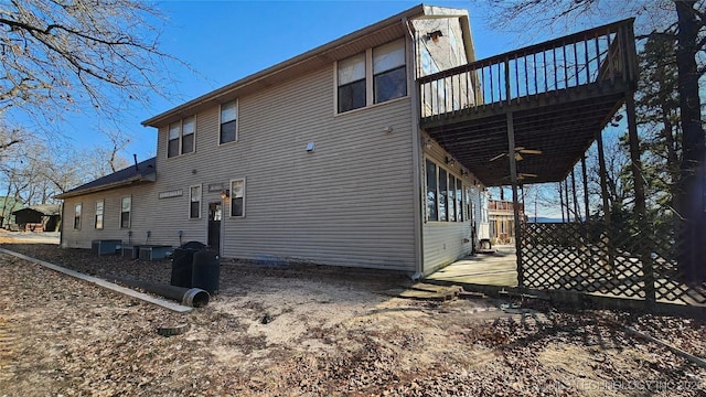 116568 S 4268th Rd, Checotah, OK 74426 - back of house with ceiling fan and central AC unit