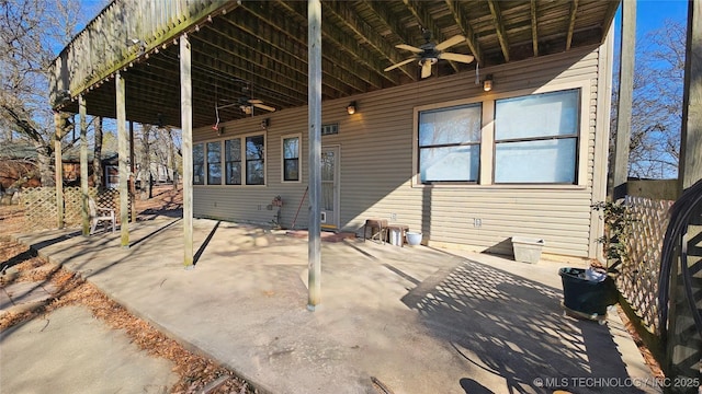 view of patio featuring ceiling fan