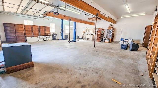 garage featuring a garage door opener and refrigerator