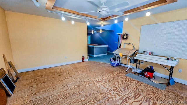 116568 S 4268th Rd, Checotah, OK 74426 - game room with ceiling fan, a tray ceiling, baseboards, and wood finished floors