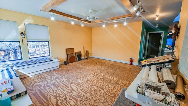 116568 S 4268th Rd, Checotah, OK 74426 - interior space featuring track lighting, a ceiling fan, and baseboards