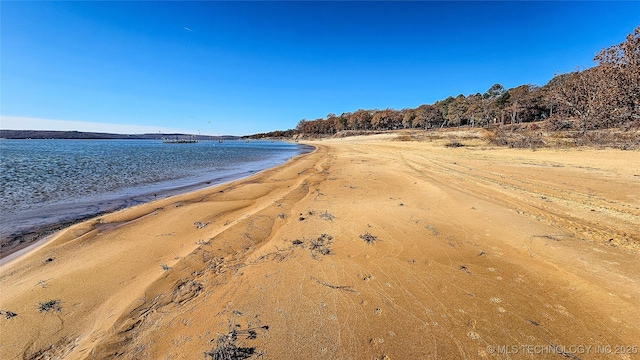 view of water feature featuring a beach view