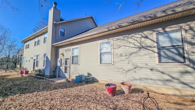 116568 S 4268th Rd, Checotah, OK 74426 - rear view of property featuring a chimney