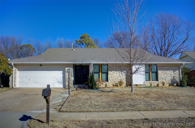 ranch-style house featuring a garage