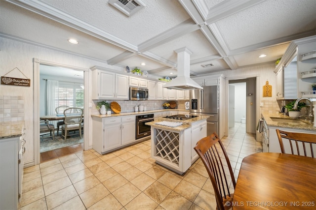 kitchen featuring white cabinetry, light stone countertops, island exhaust hood, and black appliances