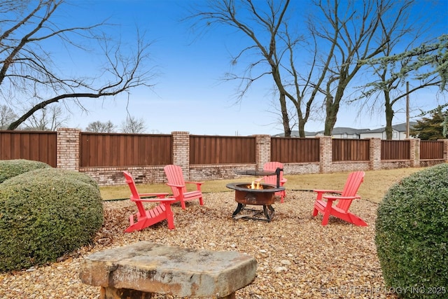 view of yard featuring a fire pit