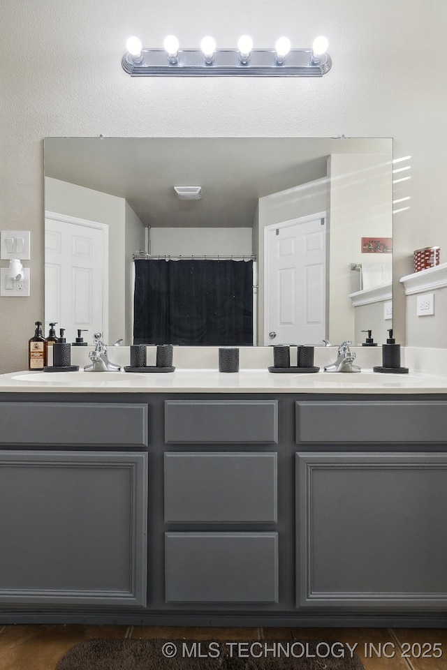 bathroom with vanity and a shower with shower curtain